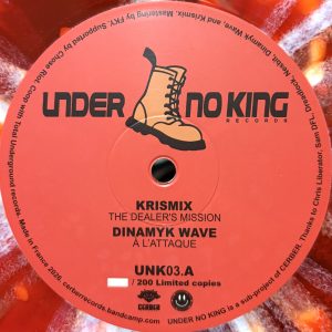 unk003 - The Dealer's Mission (Red splatter vinyl, 180gm limited pressing)